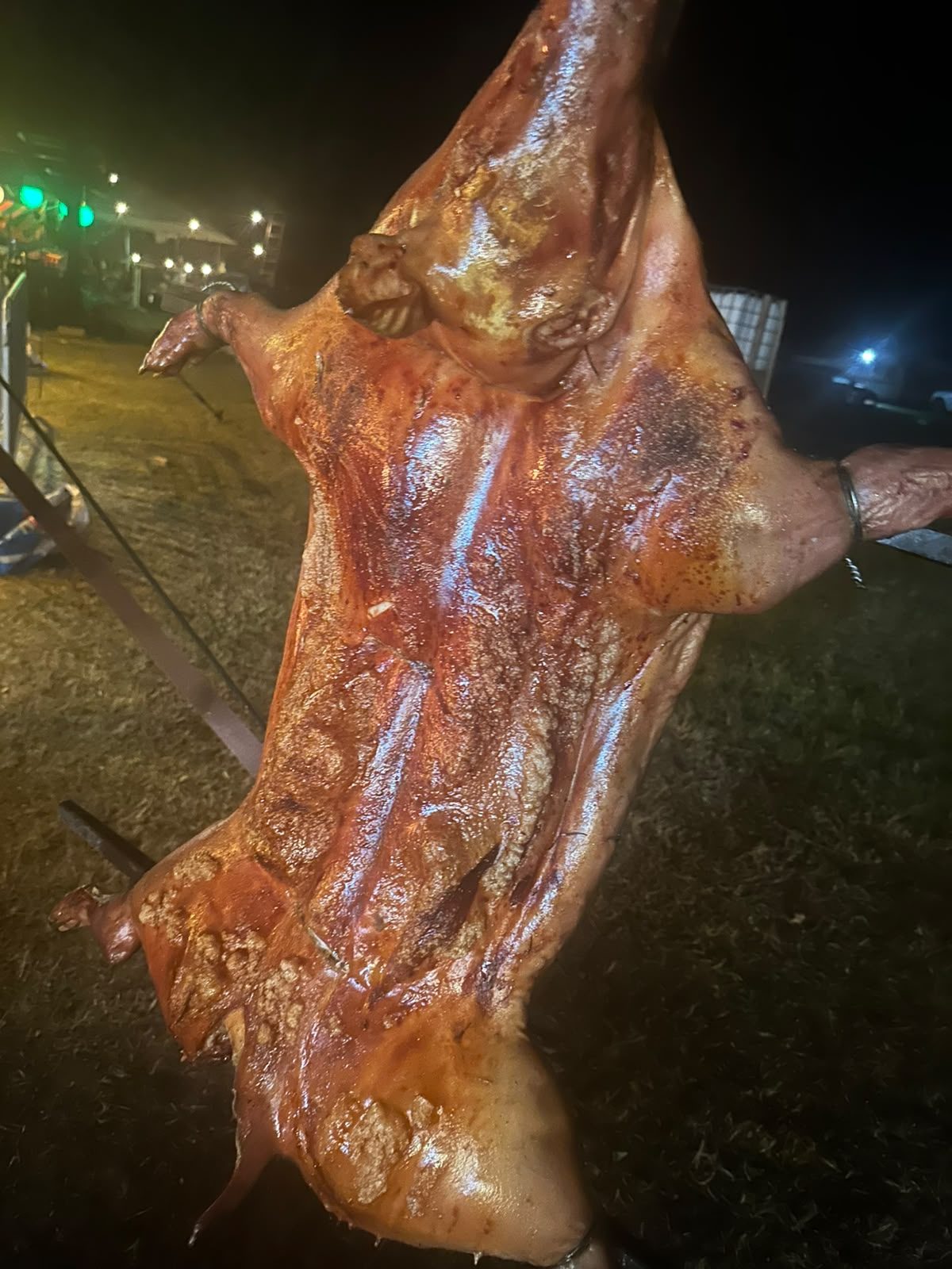 Glazed suckling pig on the spit